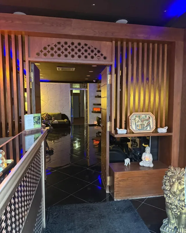 Carved wooden entrance and reception area of Arko Prestige Spa in Casablanca