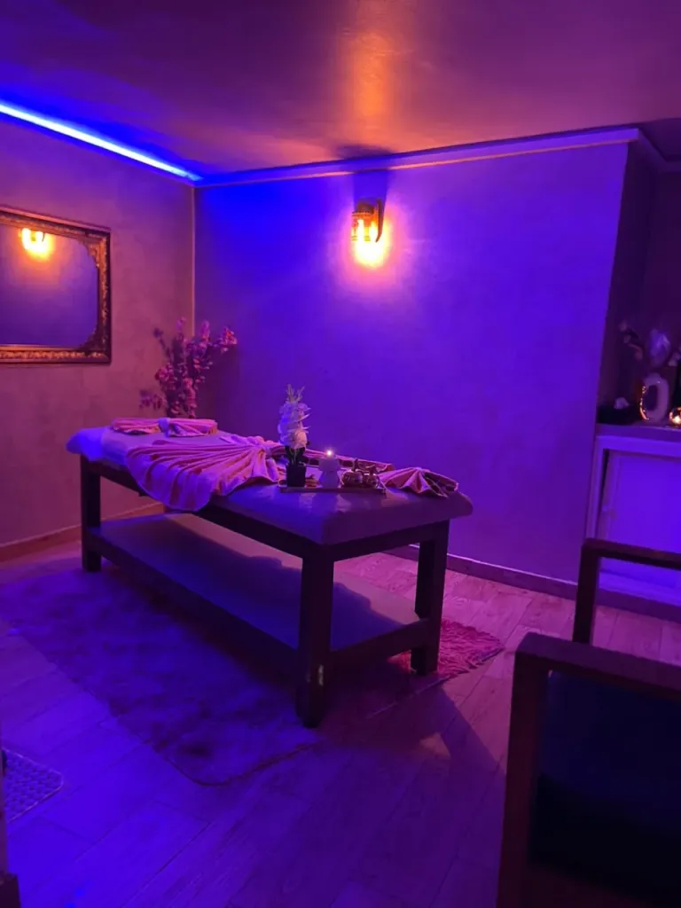 Massage area bathed in blue light at Arko Prestige Spa