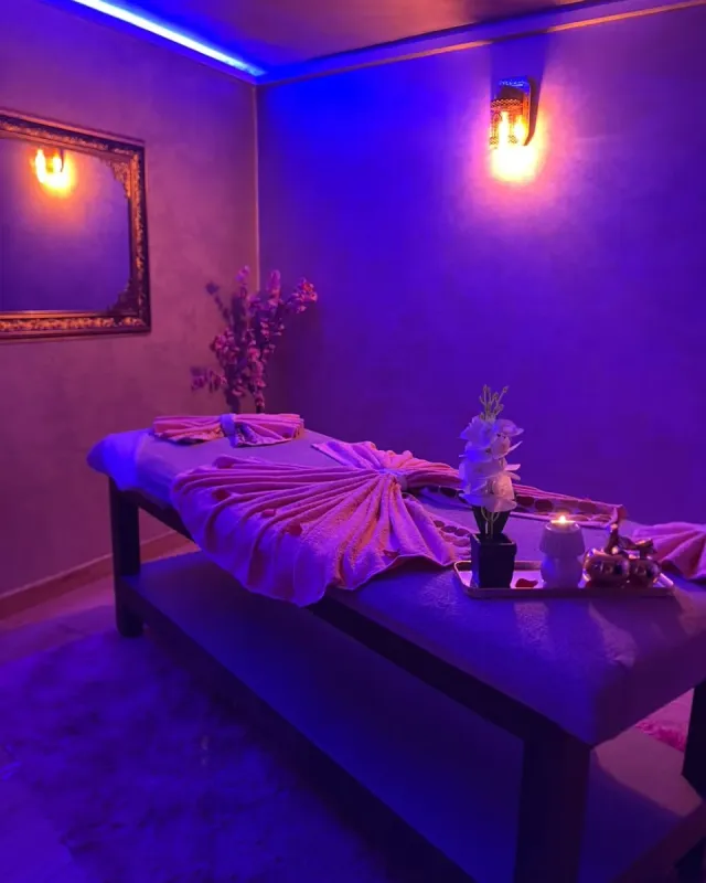 Softly lit private massage room at Arko Prestige Spa