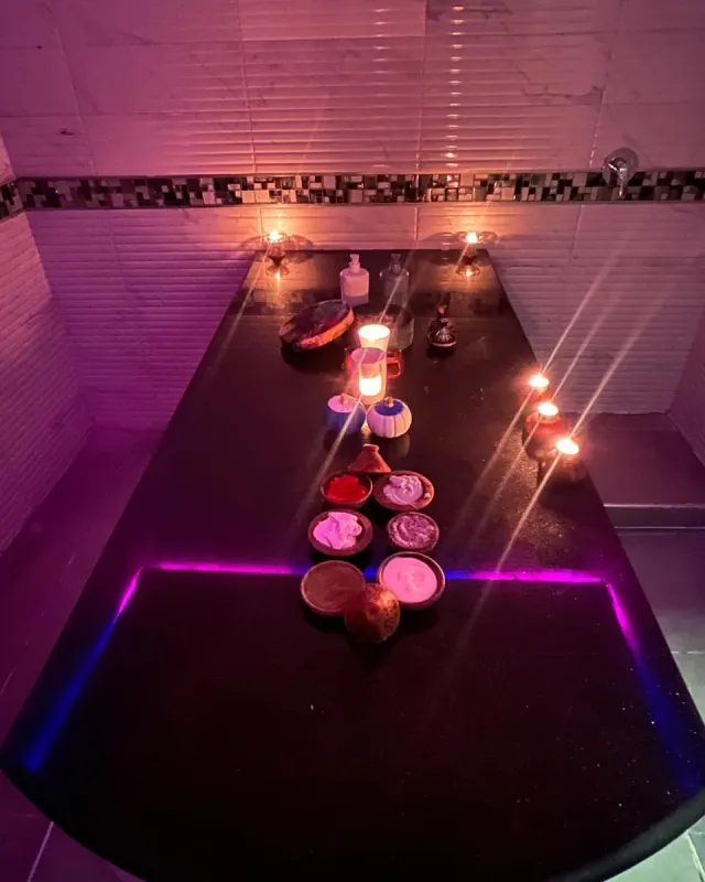 Black soap, ghassoul and natural products laid out on the hammam table at Arko Prestige Spa in Bourgogne, Casablanca