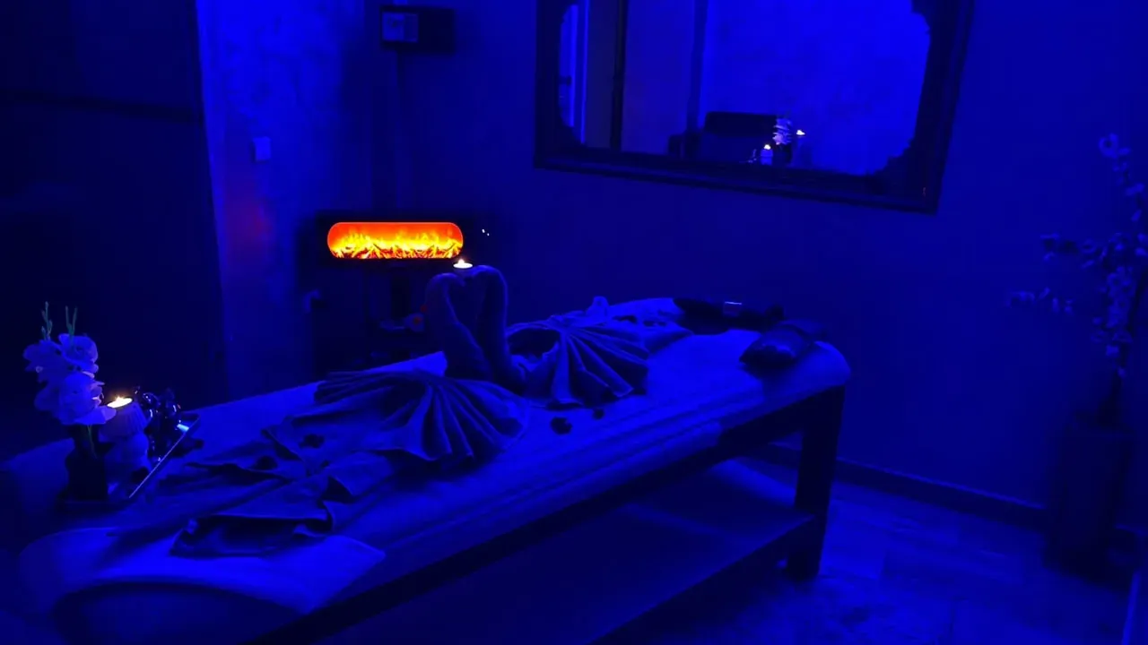 Massage room with decorative fireplace at Arko Prestige Spa in Casablanca